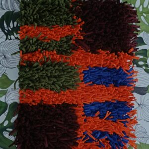 alfombra de cuatro colores con rayas