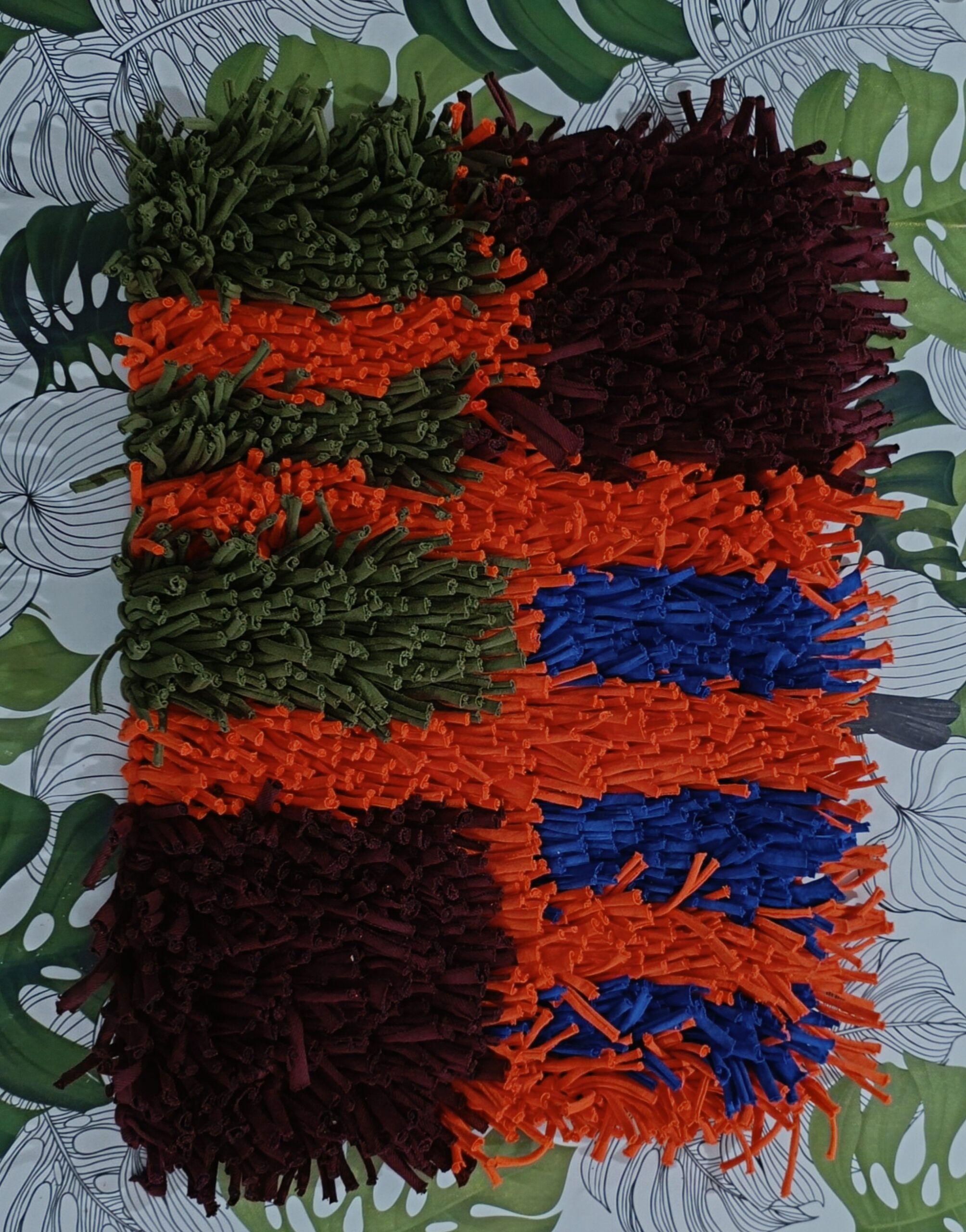 alfombra de cuatro colores con rayas